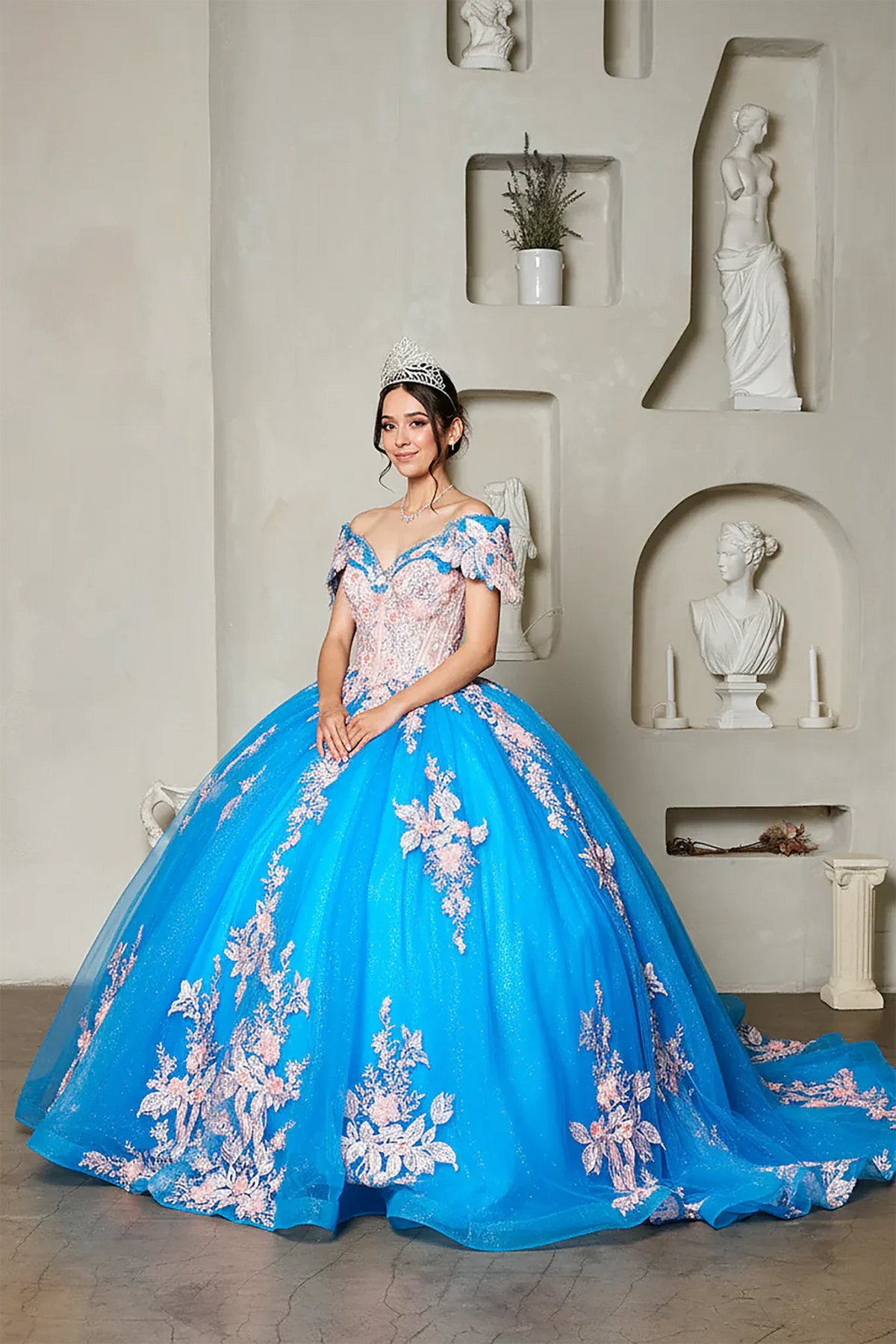 Turquoise quinceañera ball gown with blush floral applique, crystal beaded bodice and long train