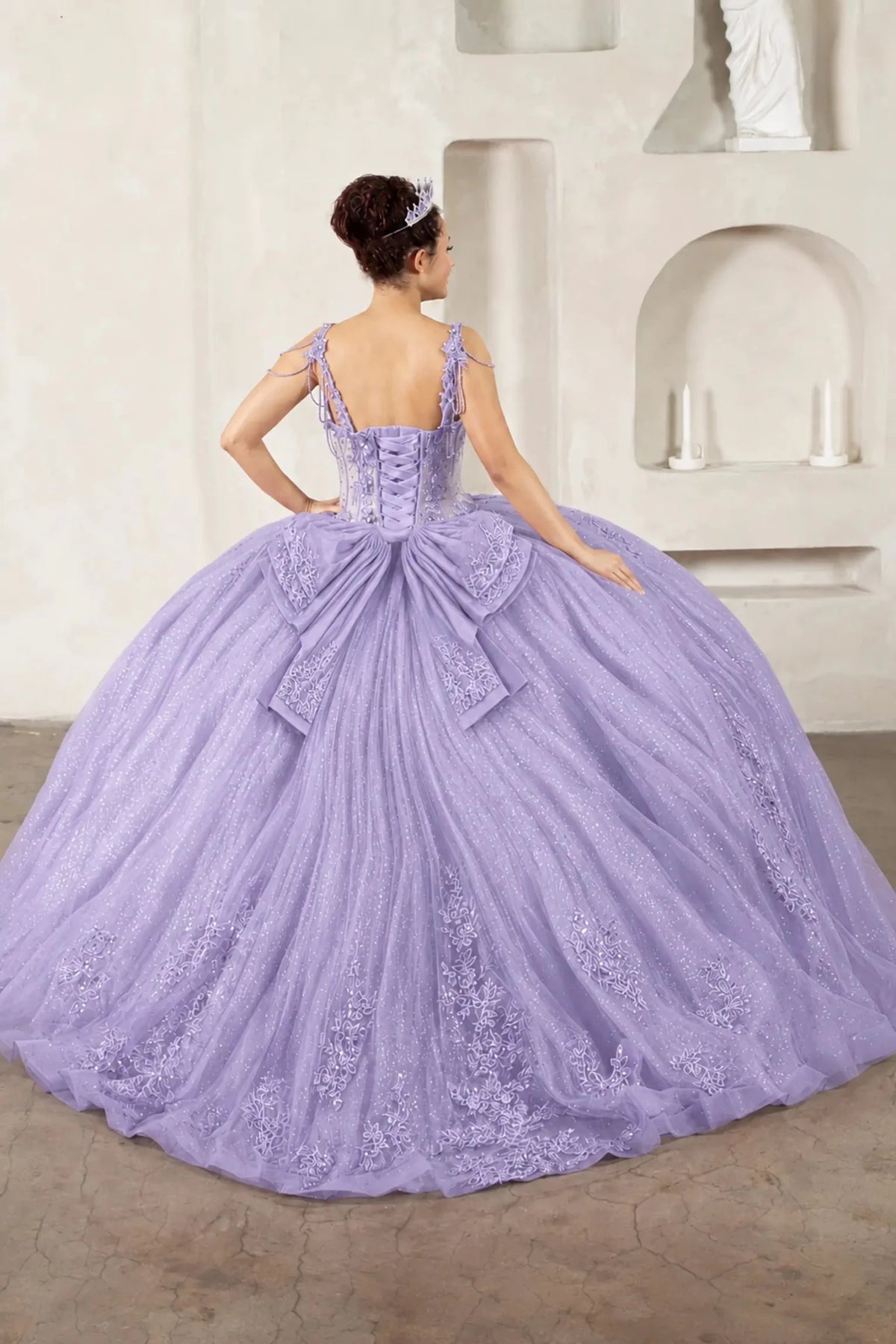 Lilac quinceañera ball gown with sheer corset bodice, 3D floral embroidery, detachable bow and sparkle tulle