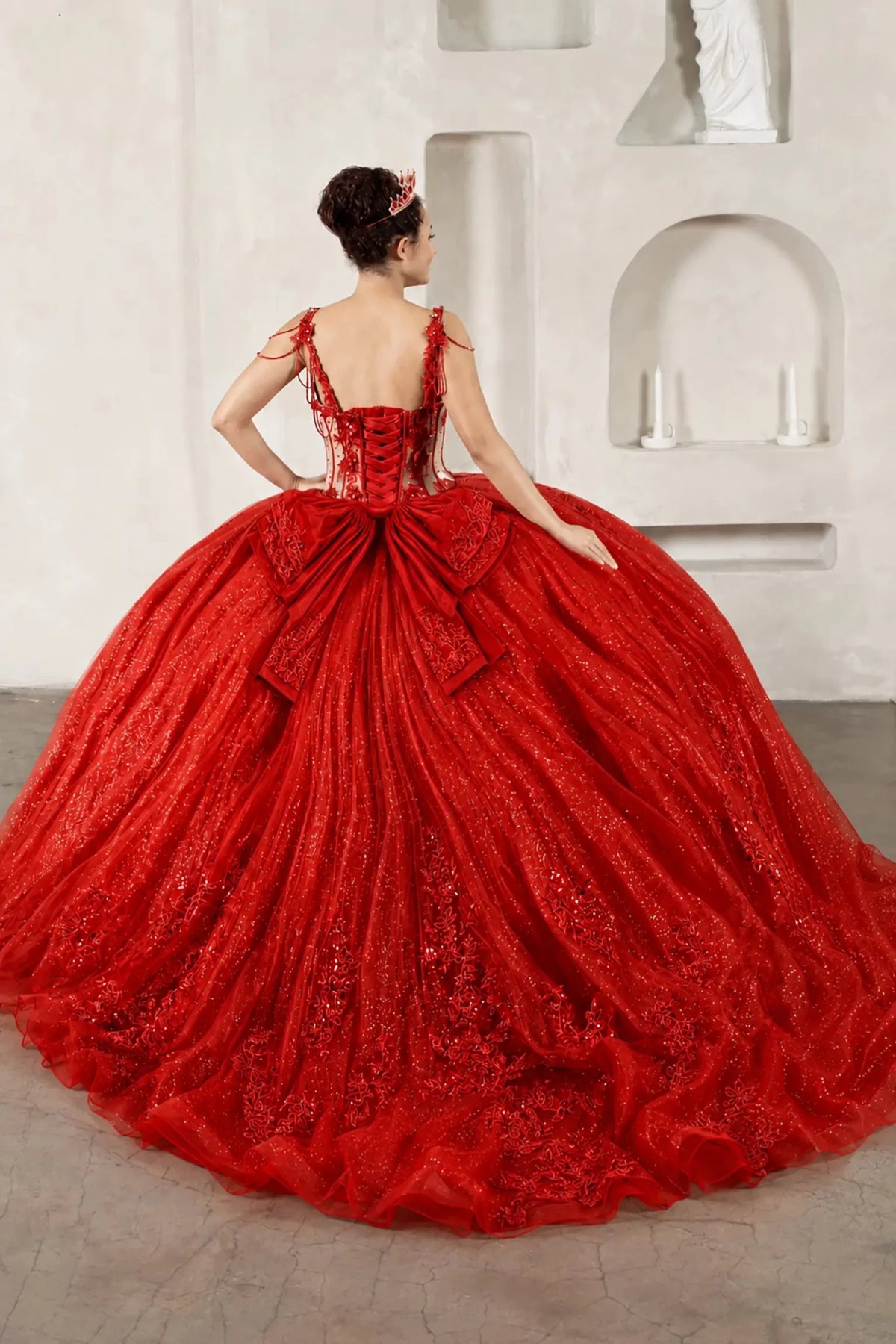 Red quinceañera ball gown with sheer corset bodice, 3D floral embroidery, detachable bow and sparkle tulle