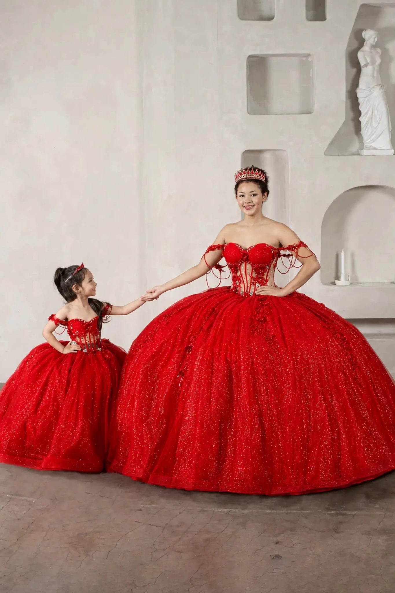 Red quinceañera ball gown with sheer corset bodice, 3D floral embroidery, detachable bow and sparkle tulle