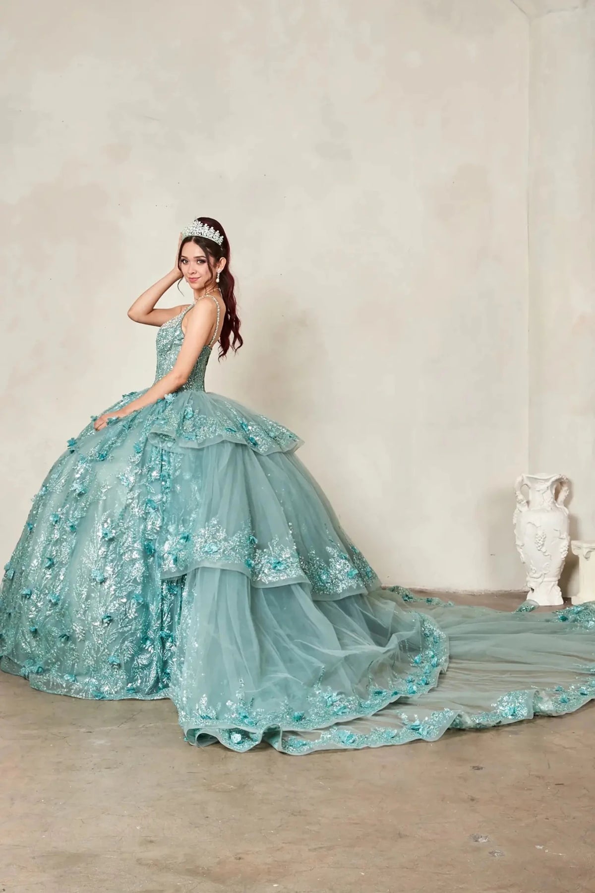 Sage quinceañera ball gown with crystal beaded bodice, floral embroidery and detachable long train