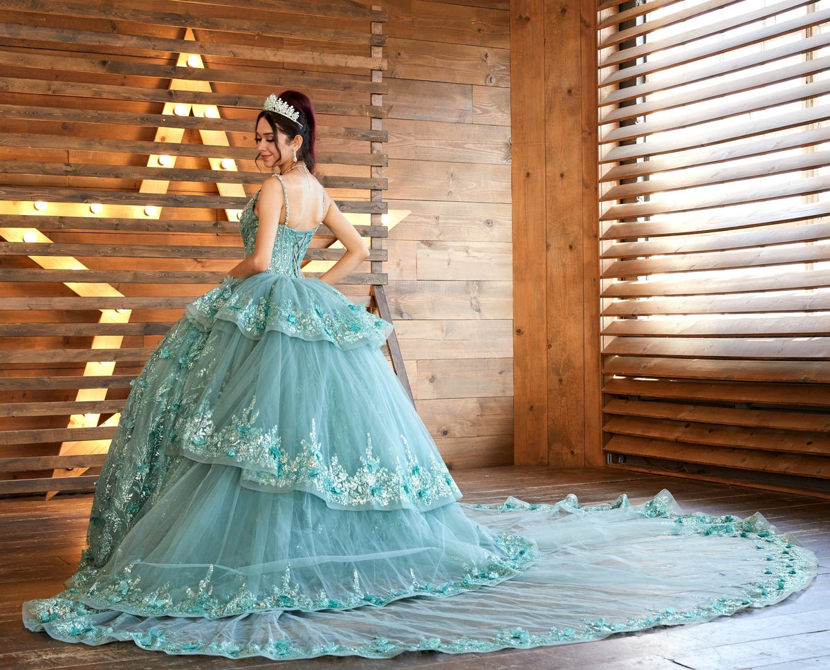 Sage quinceañera ball gown with crystal beaded bodice, V‑neckline, glitter detailing and detachable long train