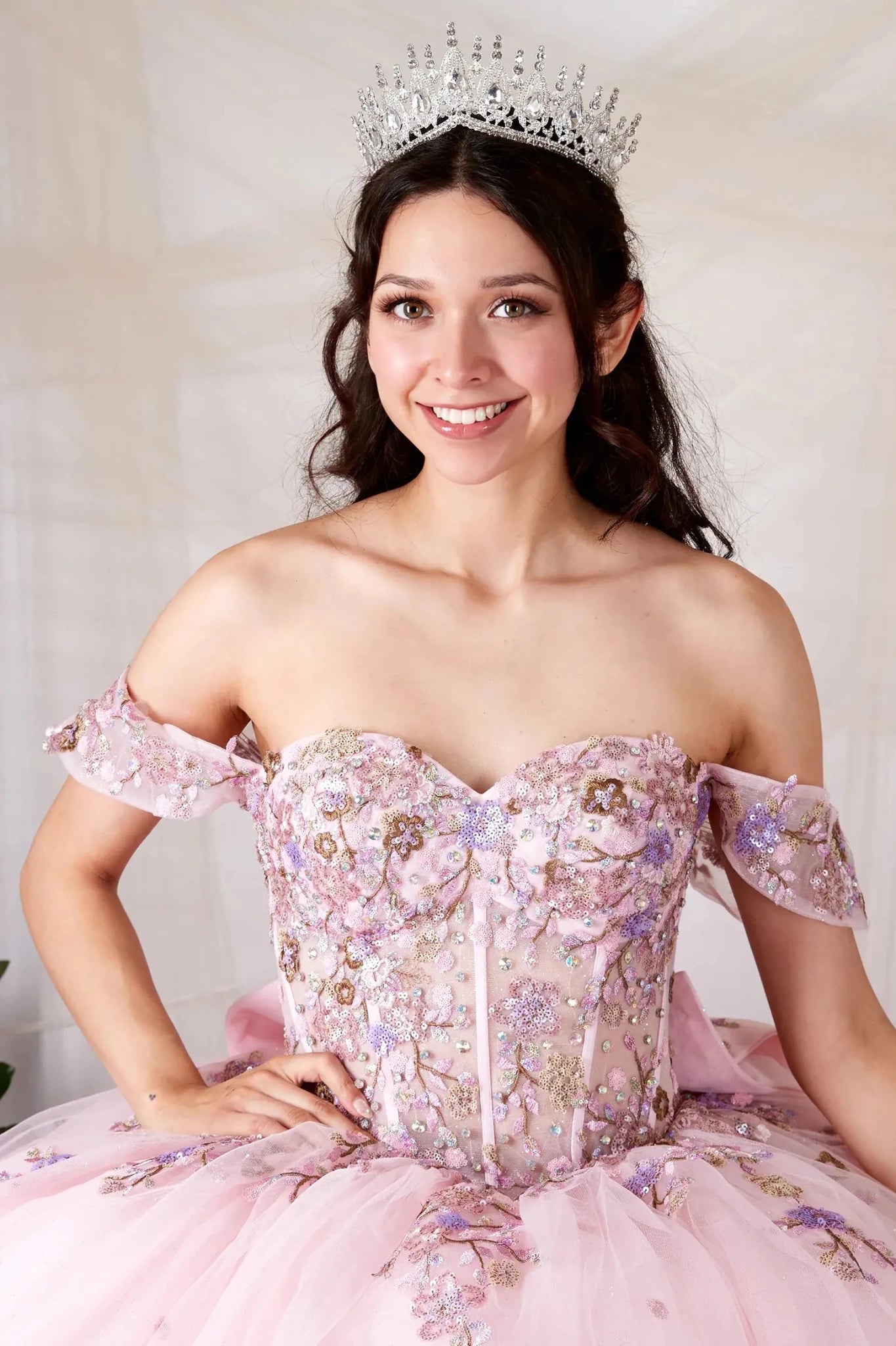 a light pink off-the-shoulder and sweetheart quineanera ball gown with floral embroidery 