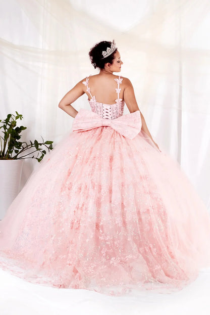 Detailed view highlights blush quinceañera ball gown with 3D butterfly straps, layered tulle skirt and detachable bow.