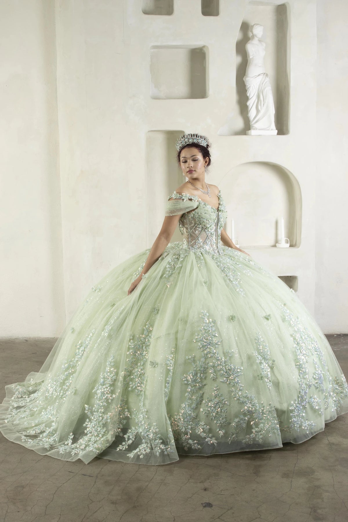 Sage quinceañera ball gown with illusion corset bodice, 3D floral applique and beaded embroidery