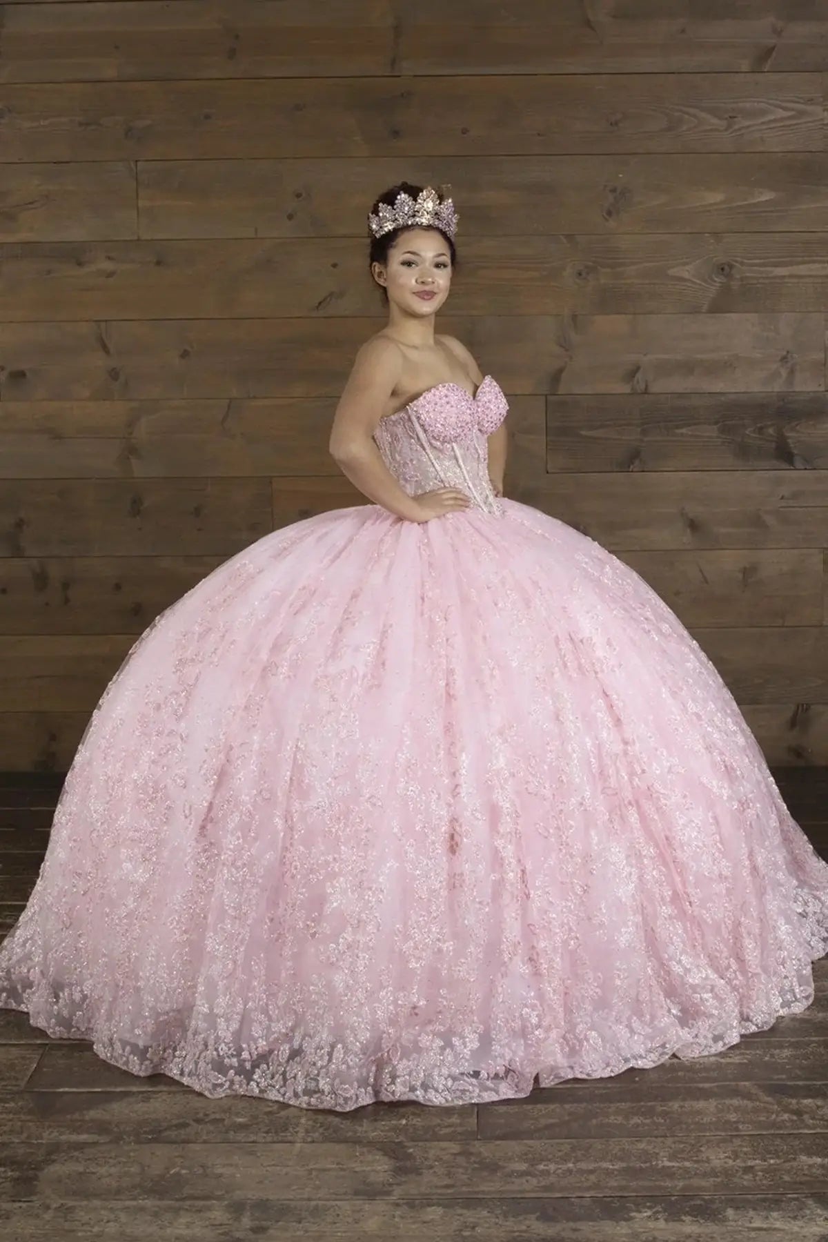 Pink quinceañera ball gown with strapless bodice, lace applique, shimmer beading and glitter tulle skirt