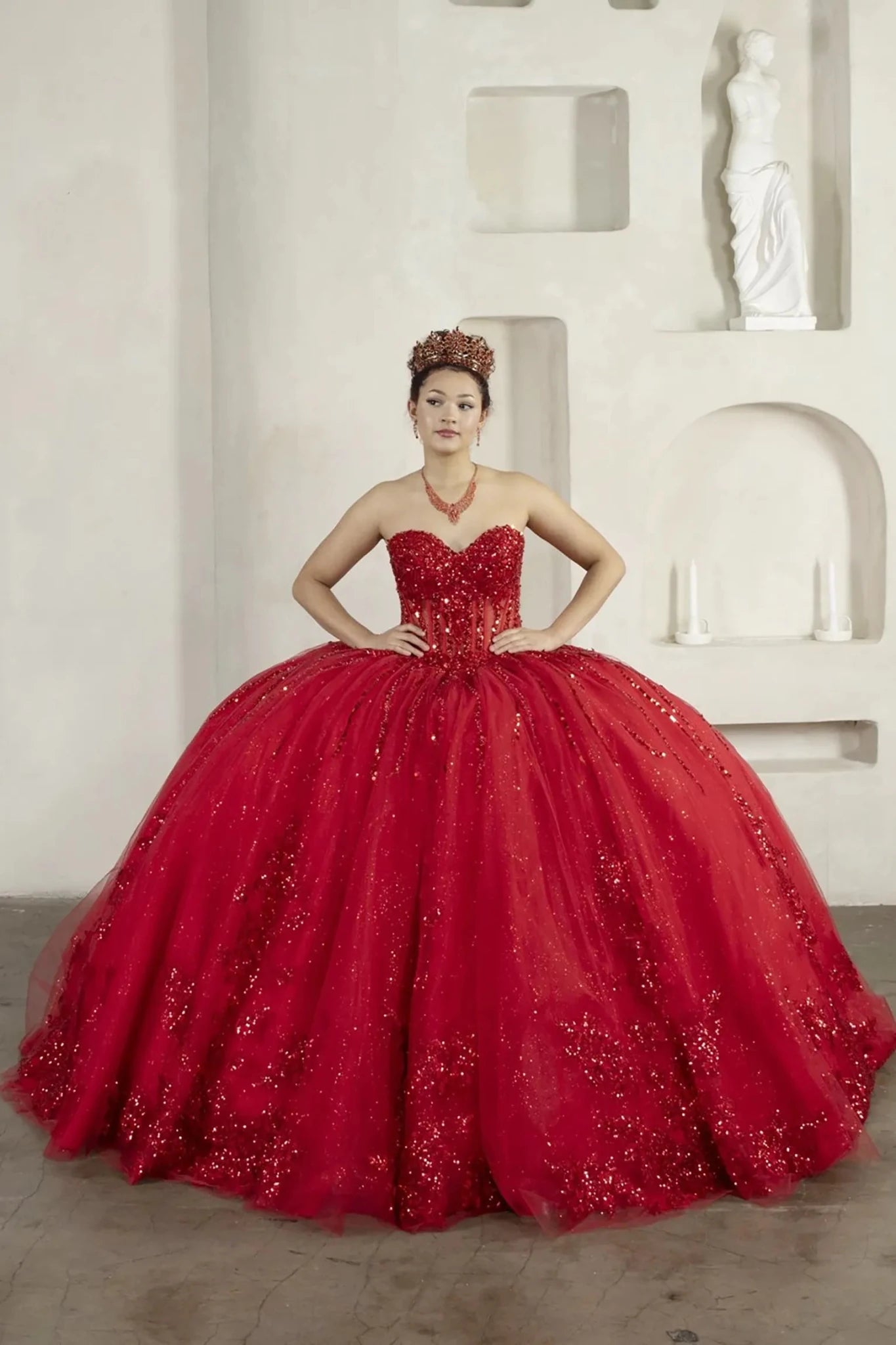 Red quinceañera ball gown with strapless bodice, lace applique, shimmer beading and glitter tulle skirt