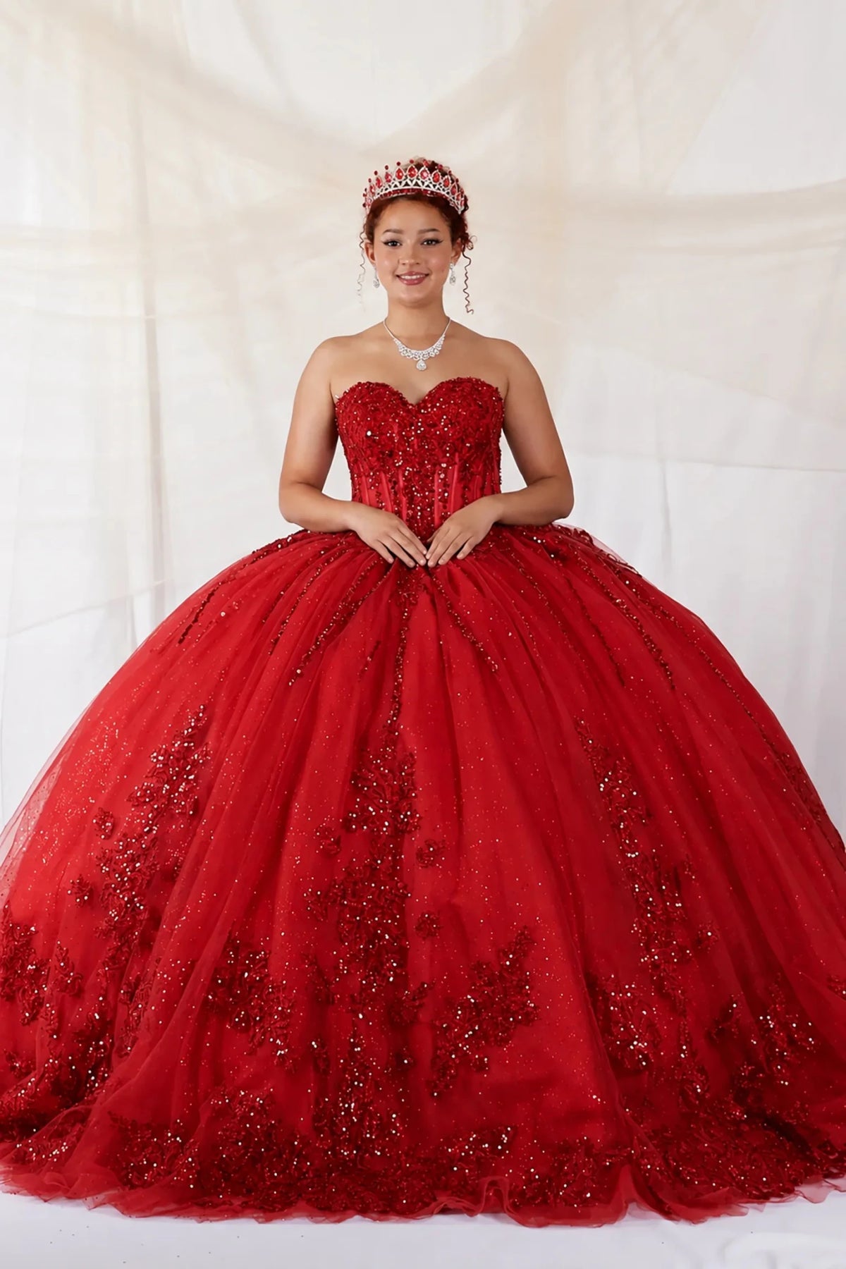 Red quinceañera ball gown with embroidered bodice, shimmer beading and glitter tulle skirt