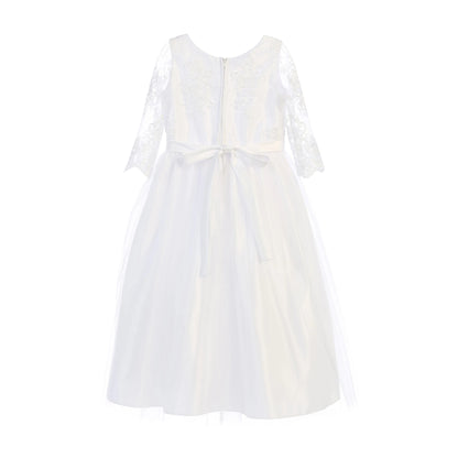 Decorative elements define USA-Made White communion dress with a bow detail.