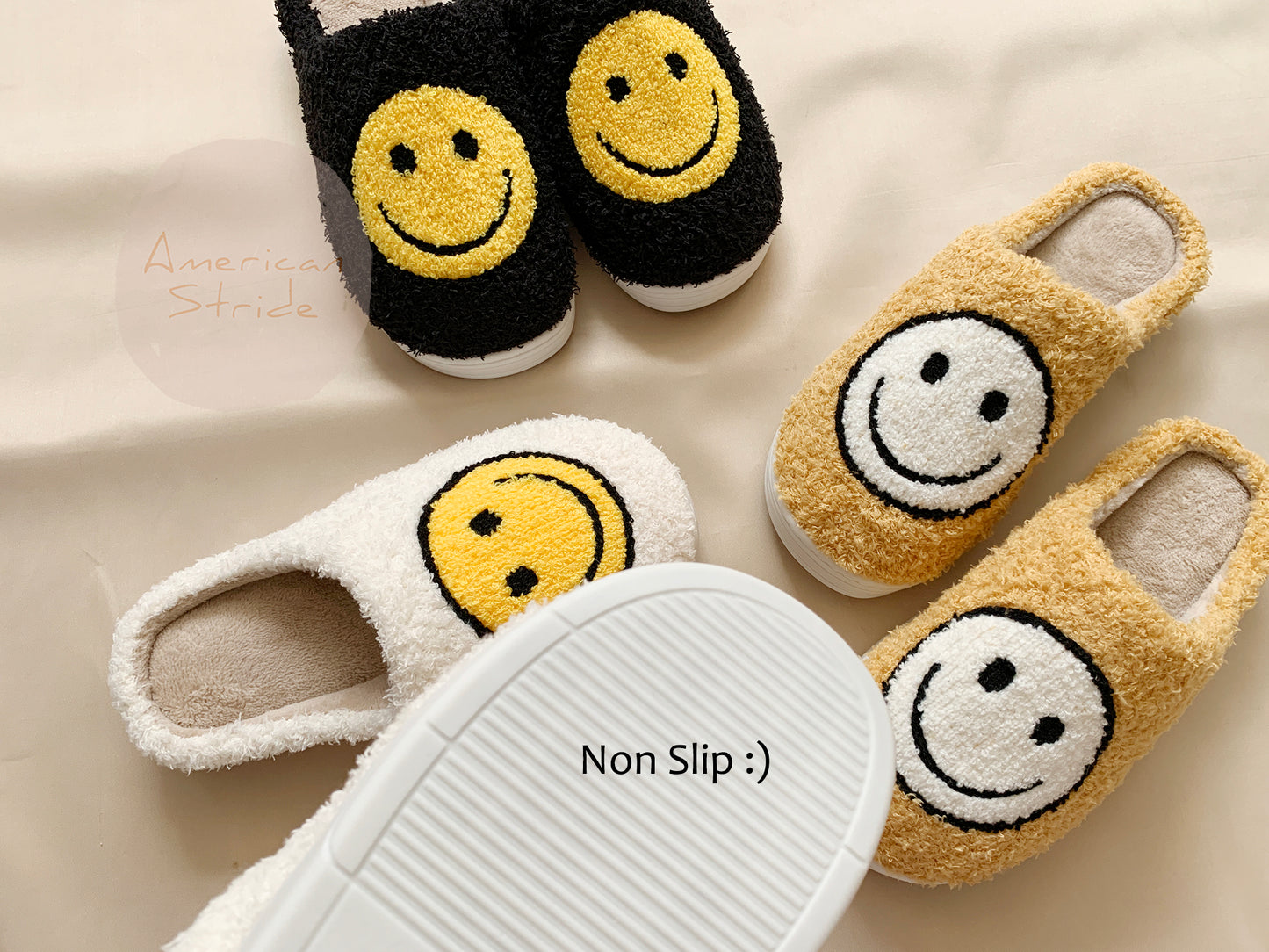 Black ivory camel fluffy women's winter slippers, sole detail.