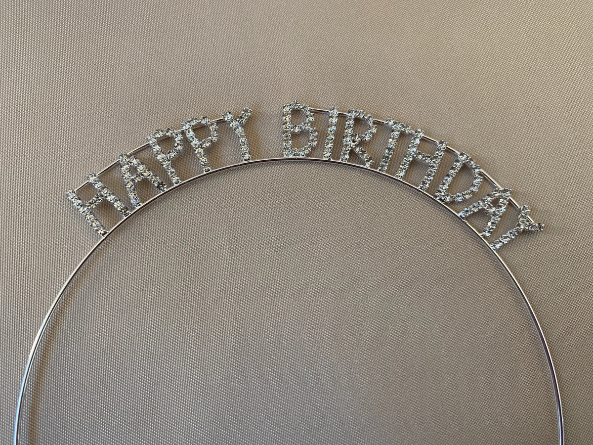 Silver rhinestone flower girl tiara.