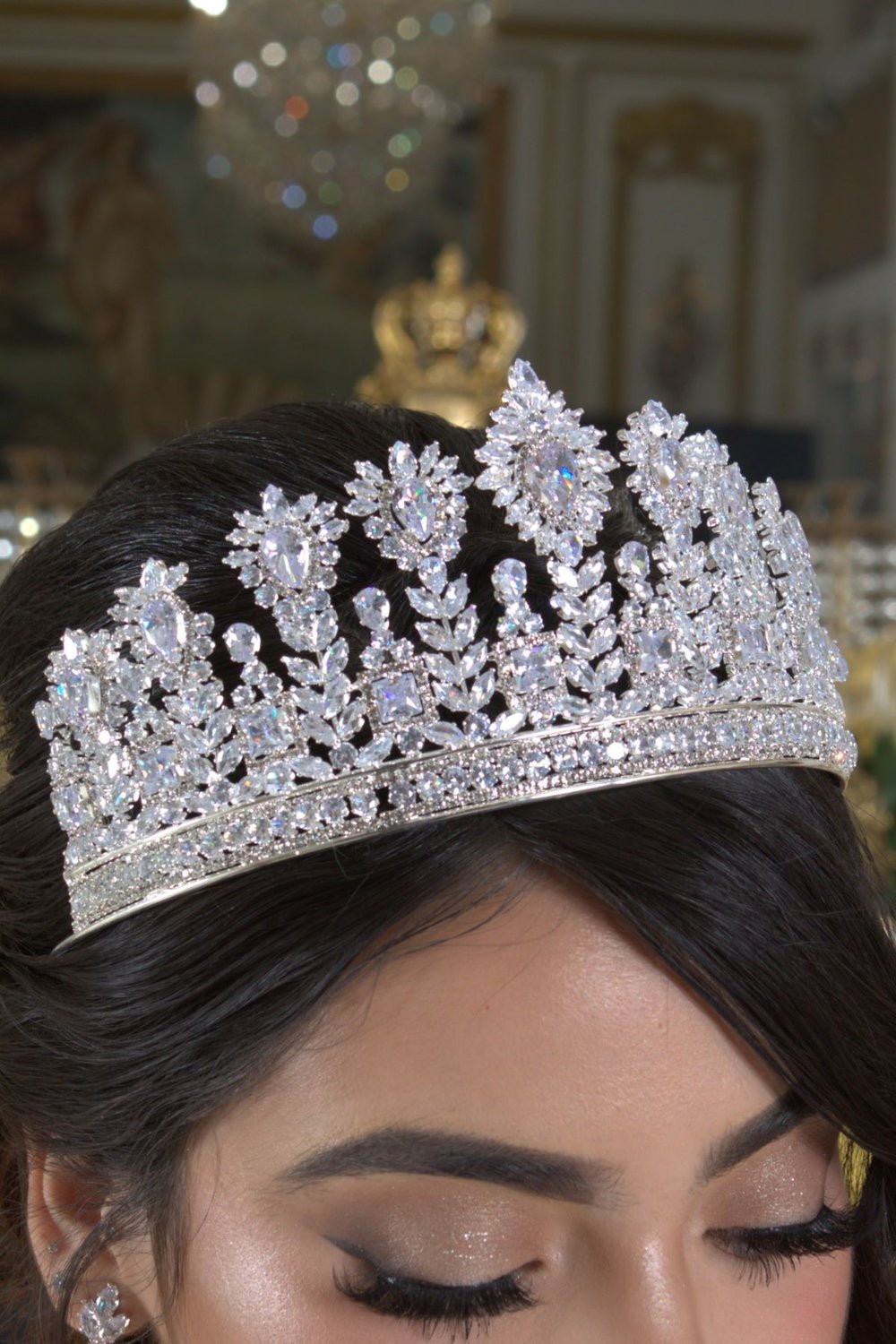 Silver floral quinceañera tiara, close-up view.