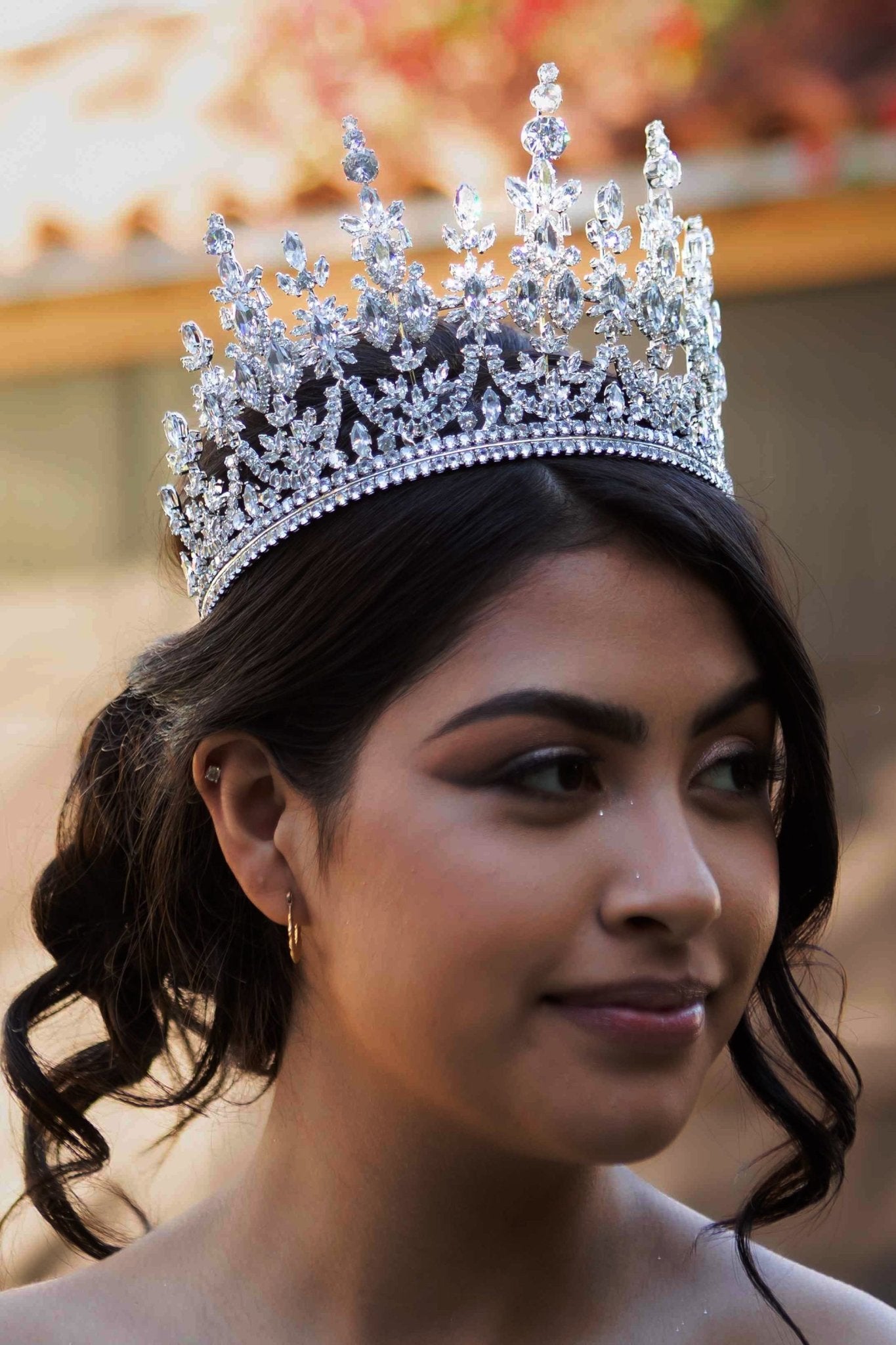 Silver floral quinceañera tiara, side view.