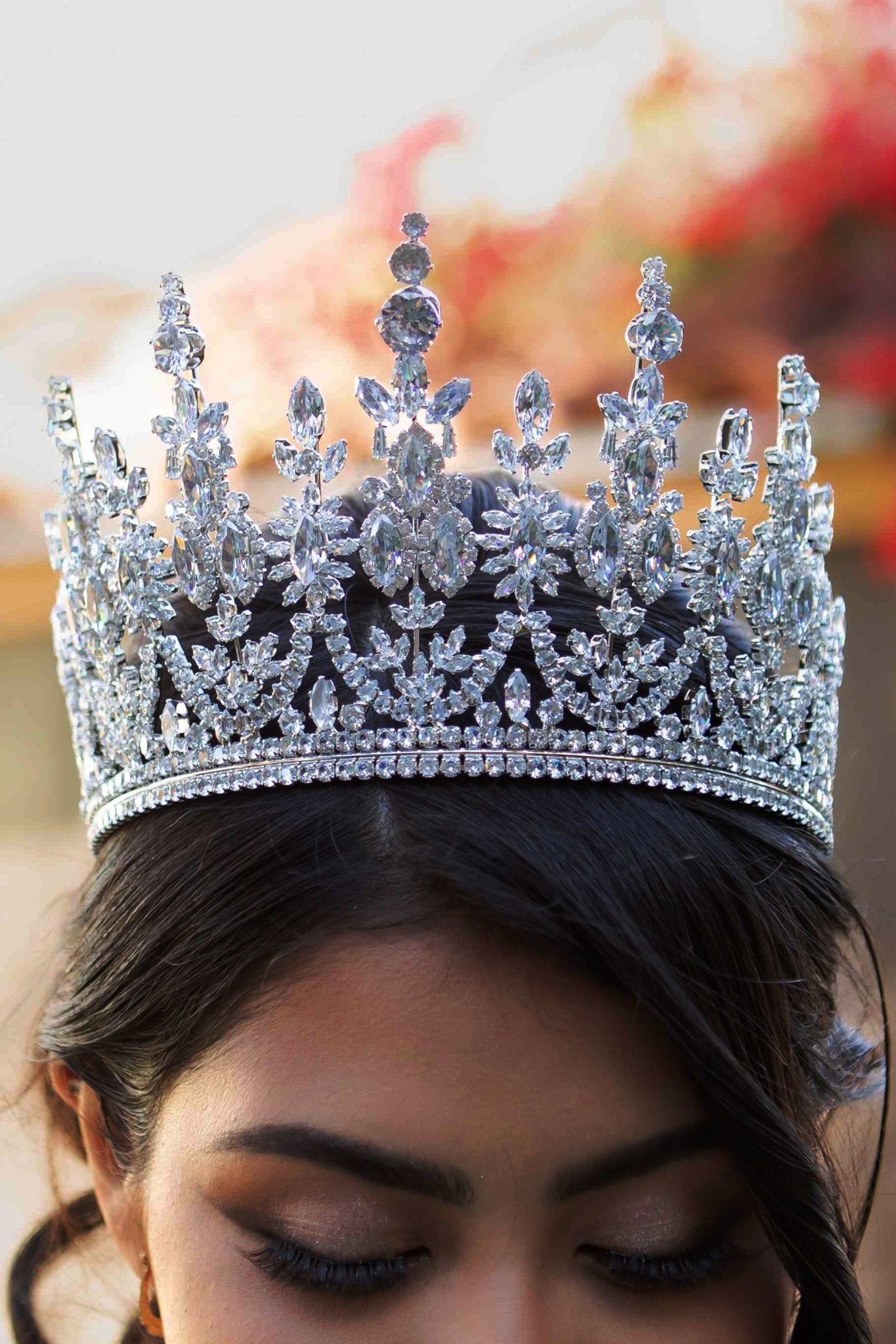 Silver floral quinceañera tiara, front view.