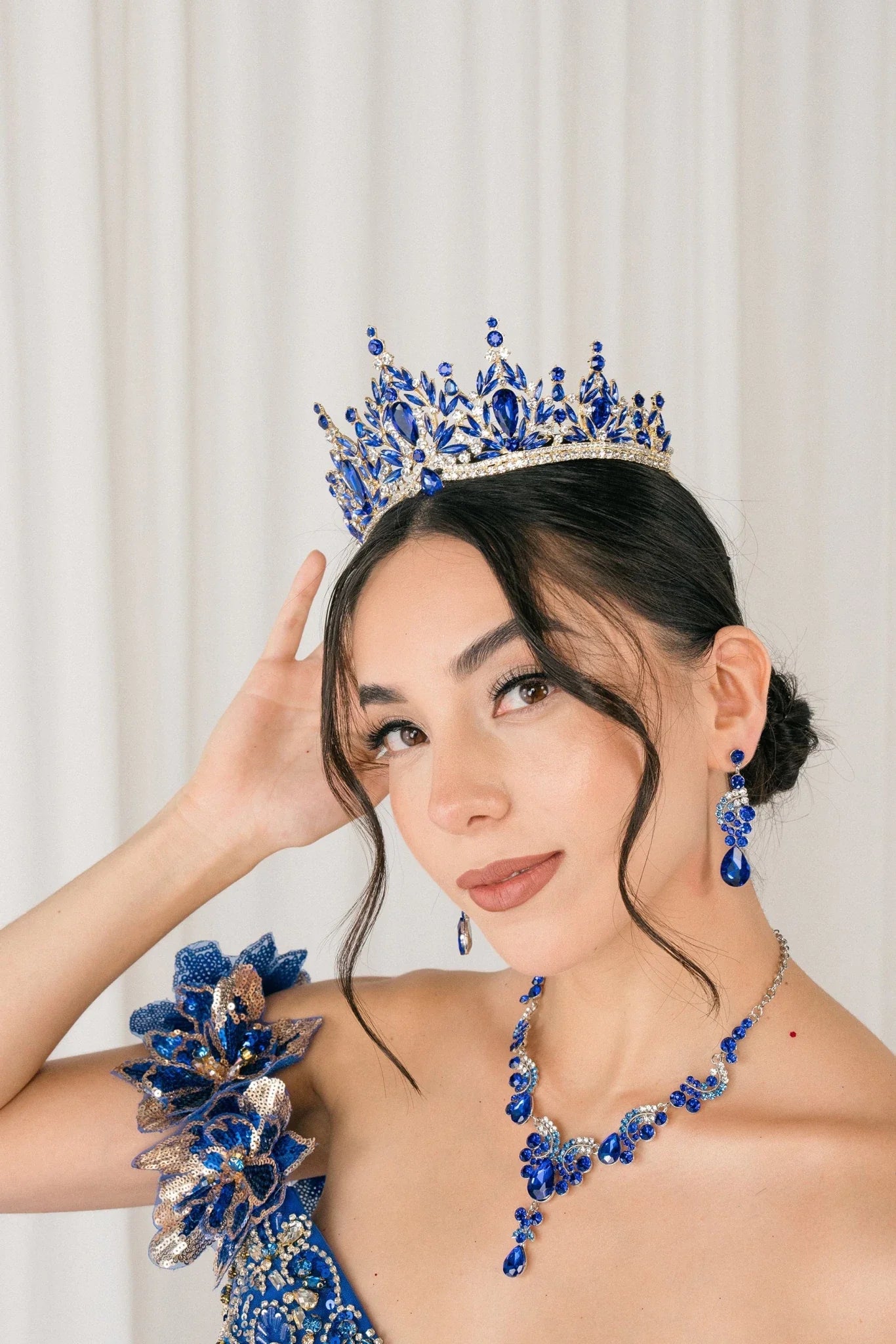 Royal blue rhinestone quinceañera tiara.