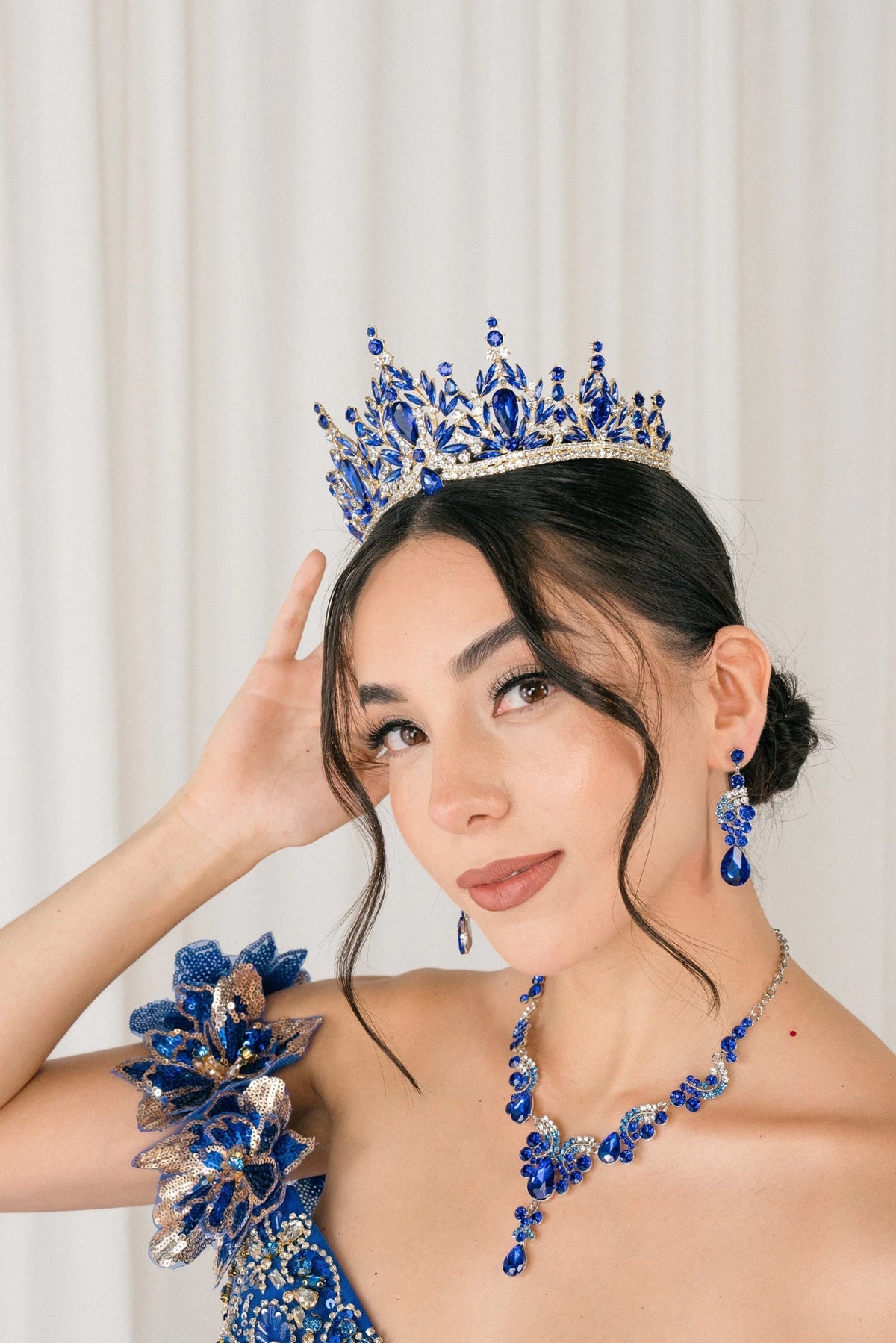 Royal blue rhinestone quinceañera tiara.
