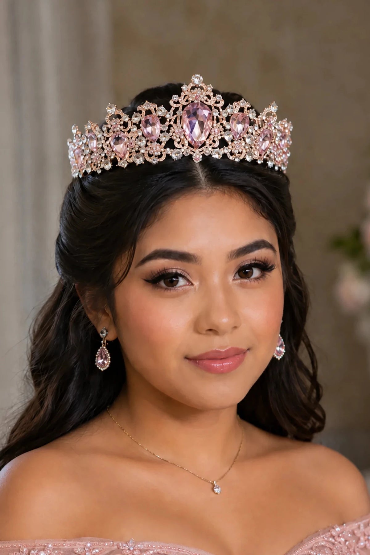 Rose gold rhinestone quinceañera tiara, close-up view.