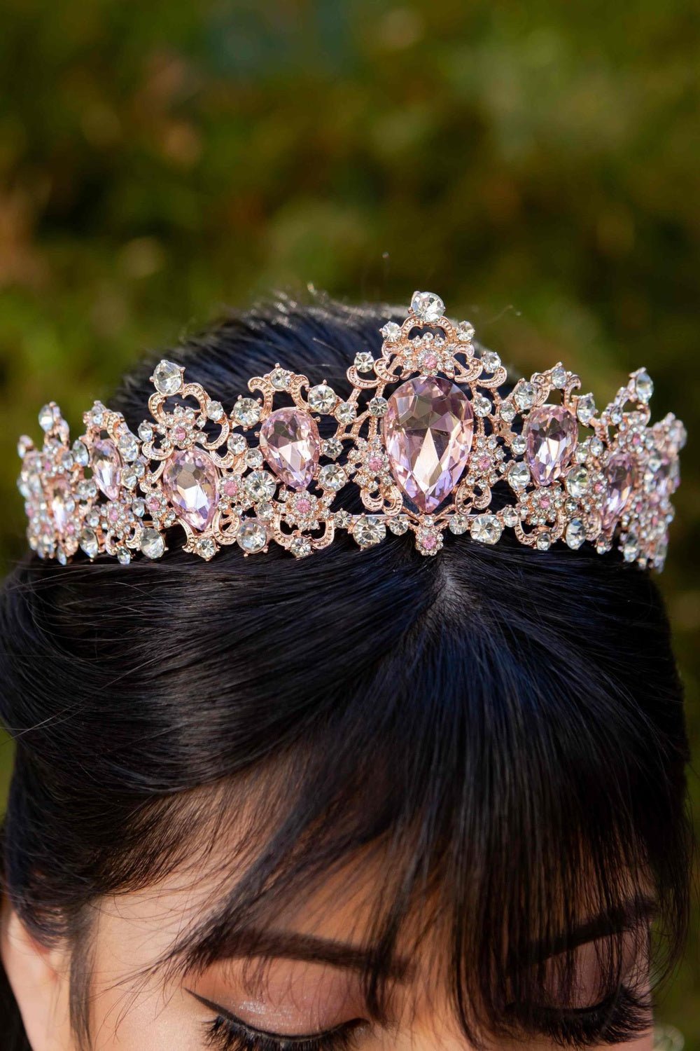 Rose gold rhinestone quinceañera tiara, close-up view.