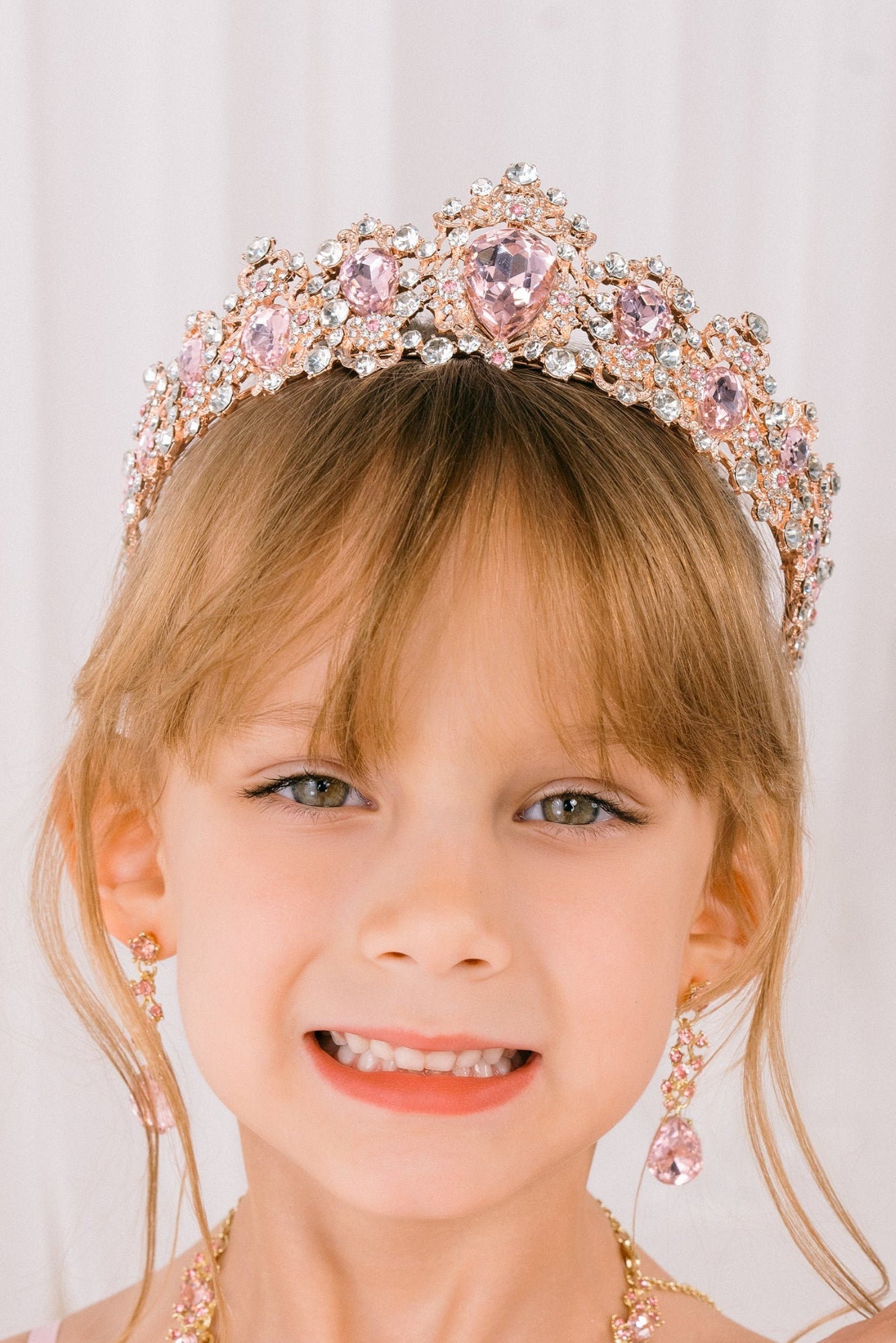 Rose gold rhinestone quinceañera tiara.