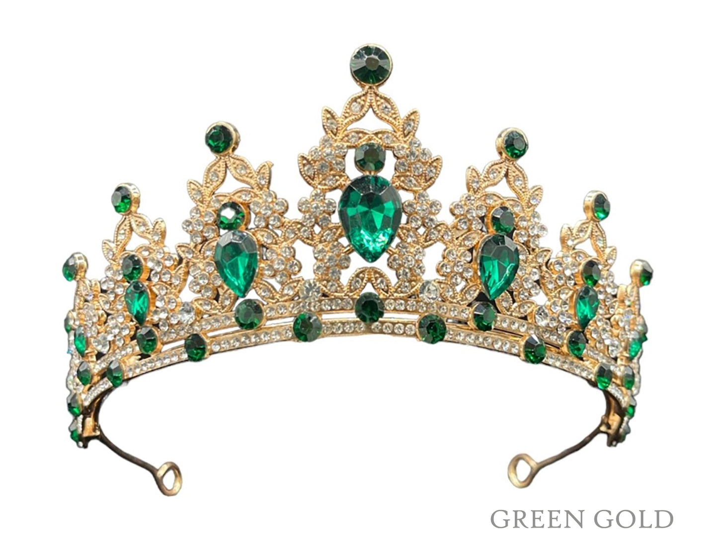 gold crown with green colored jewels