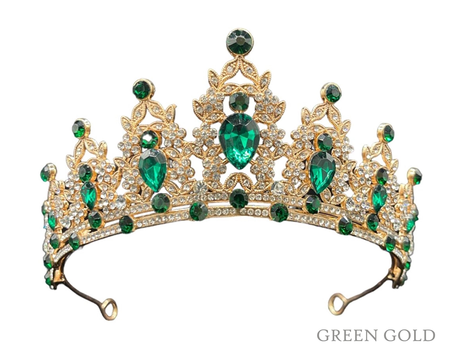 gold crown with green colored jewels