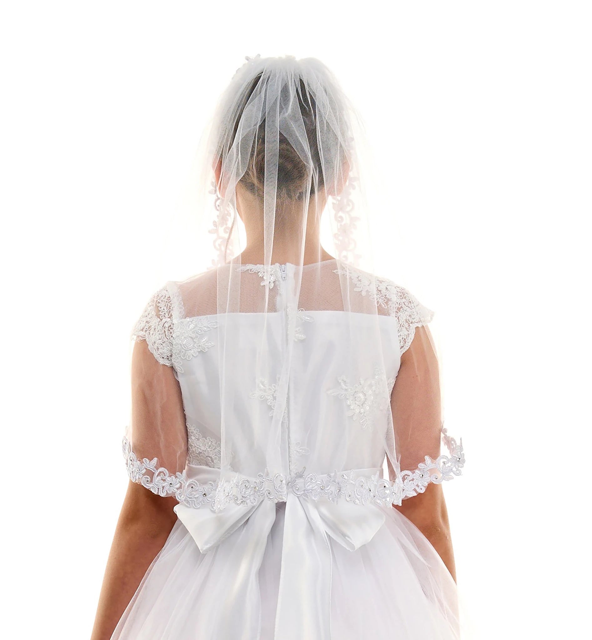 White rhinestone lace floral first communion veil, close-up, embellishment detail.