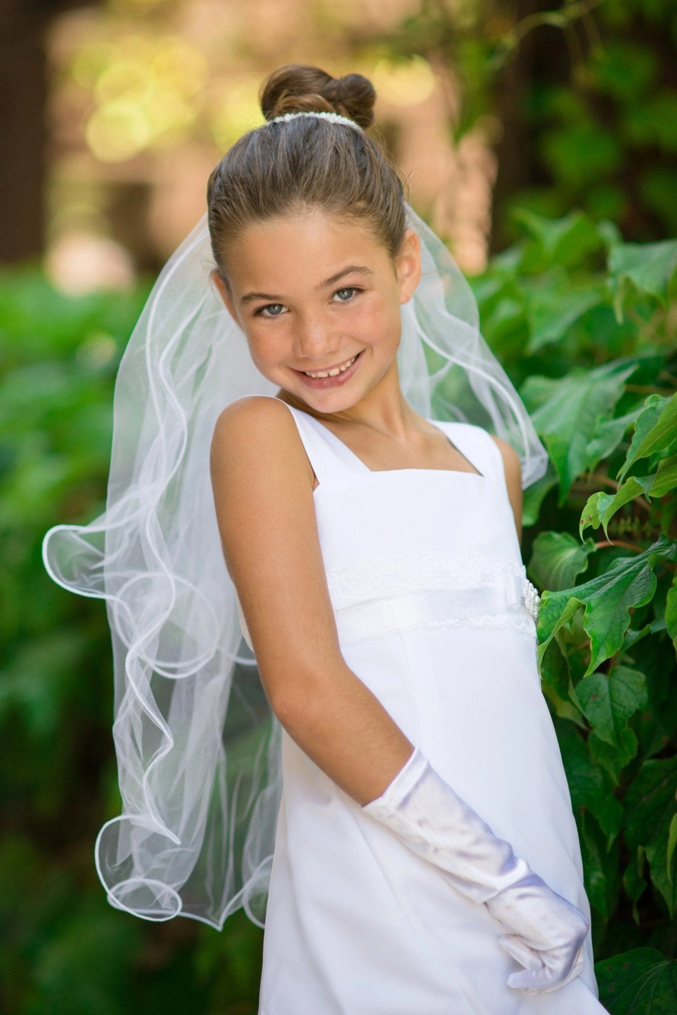 White pearl first communion veil.