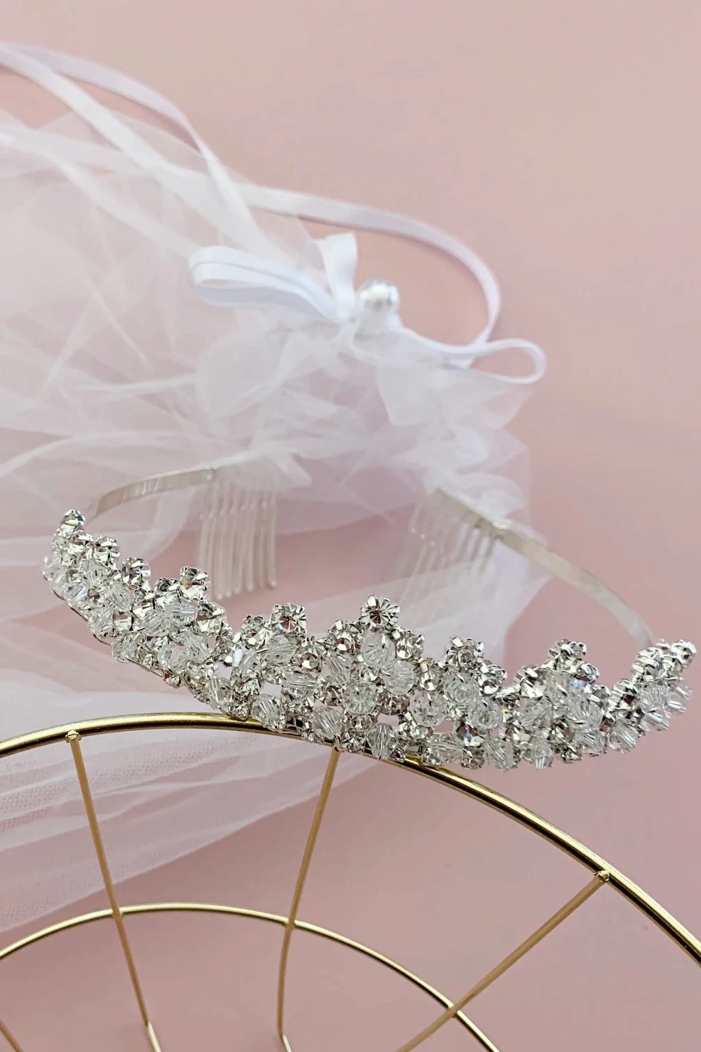 Silver rhinestone flower girl and first communion tiara and two-tier veil.