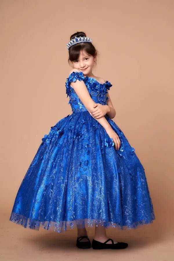 Side view of royal blue mini quince dress with dimensional 3D floral detail, shimmering glitter highlights, and flowing full skirt.