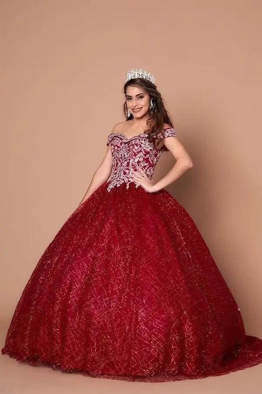 Front-Facing of a woman wearing Burgundy ball gown with sequin embellishments glitter tulle skirt and structured bodice design