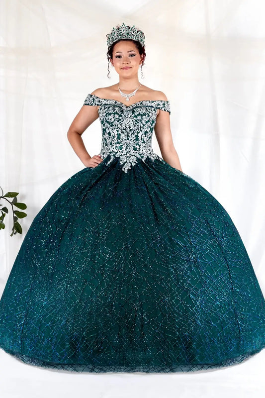 Front-Facing of a woman wearing Emerald green ball gown with sequin embellishments glitter tulle skirt and elegant structured bodice