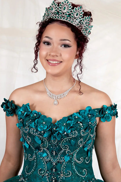 Front Close-Up of a woman wearing of emerald bodice highlighting 3D floral appliqué off-shoulder neckline and refined detail