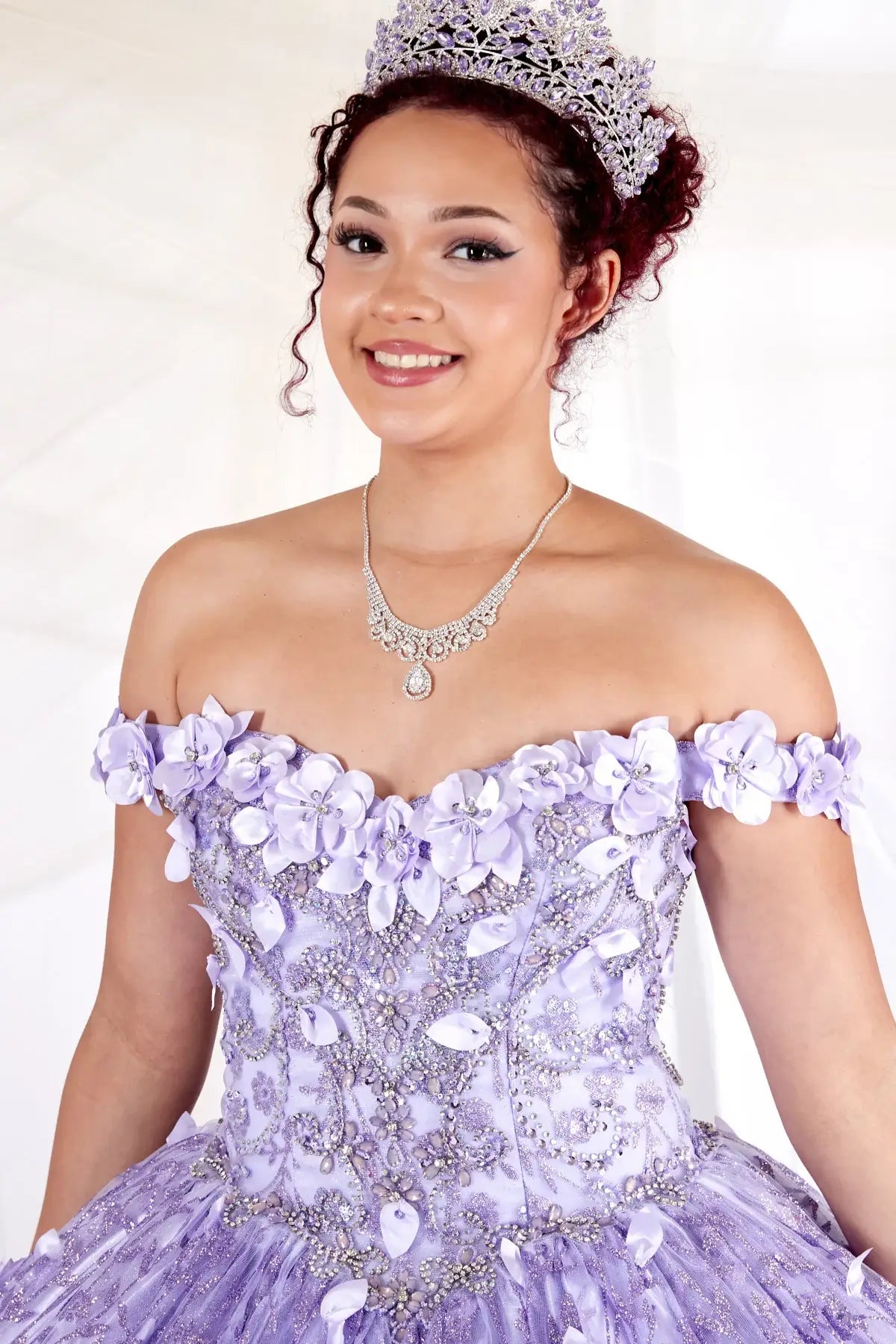 Front Close-Up of a woman wearing of lilac bodice highlighting floral appliqués off-shoulder neckline and structure