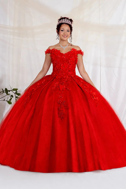 Woman wearing a red quinceanera ball gown with floral details 