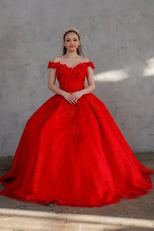 Front-Facing of a woman wearing Red ball gown with off-shoulder neckline intricate 3D floral appliqués and voluminous skirt