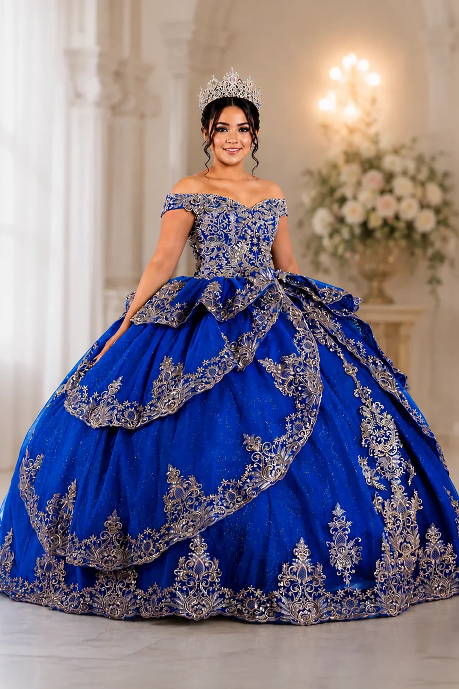 elaborate royal blue off-the-shoulder quinceanera ball gown with ornate silver embroidery