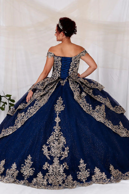 navy quuince ball gown with ornate embroidery and long train