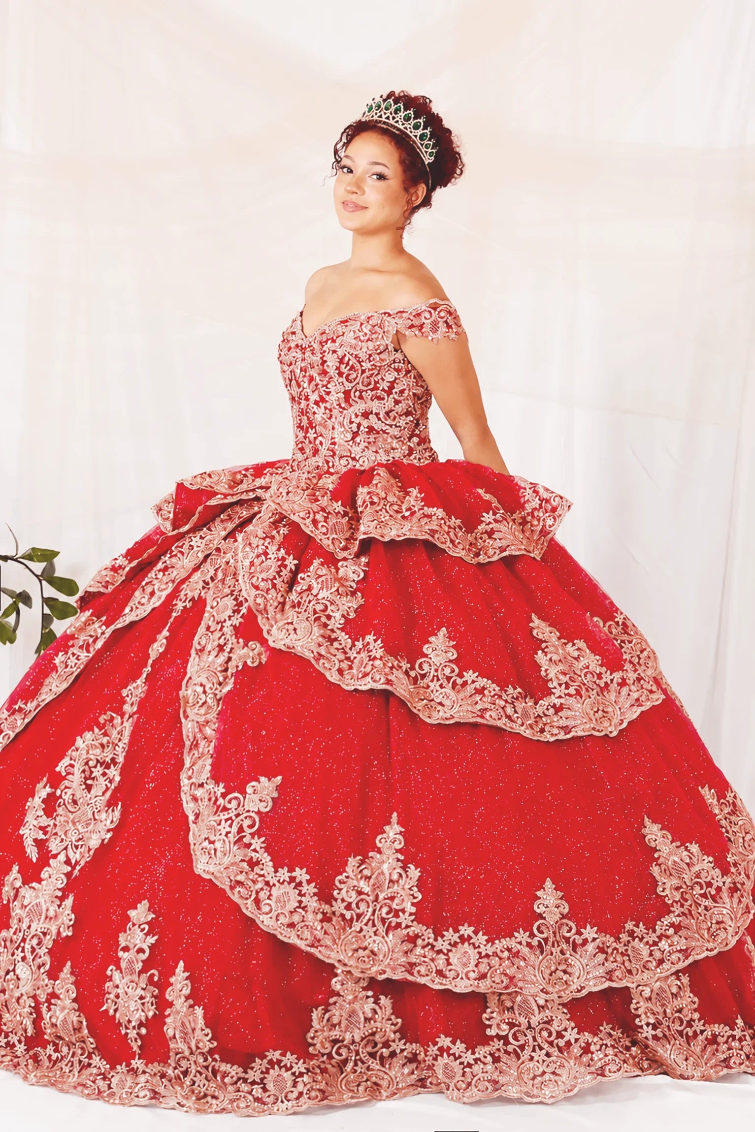 voluminous off-the-shoulder red quinceañera ball gown with intricate gold lace embroidery