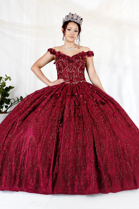 Bodice close-up highlights burgundy quinceañera ball gown with off‑shoulder neckline, delicate floral applique and flowing skirt.