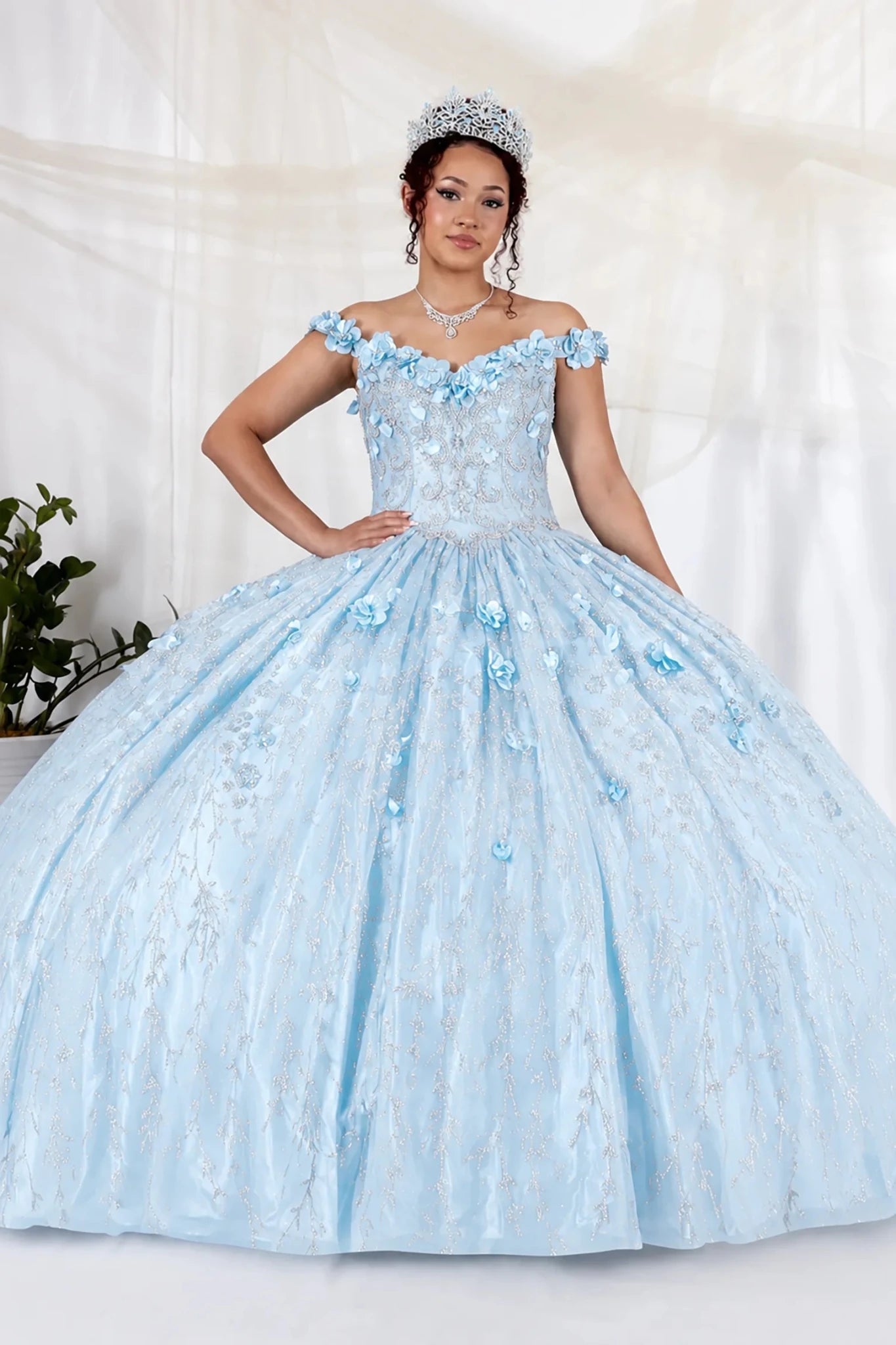 Bahama blue quinceañera ball gown with off‑shoulder neckline, floral lace applique and 3D flower details