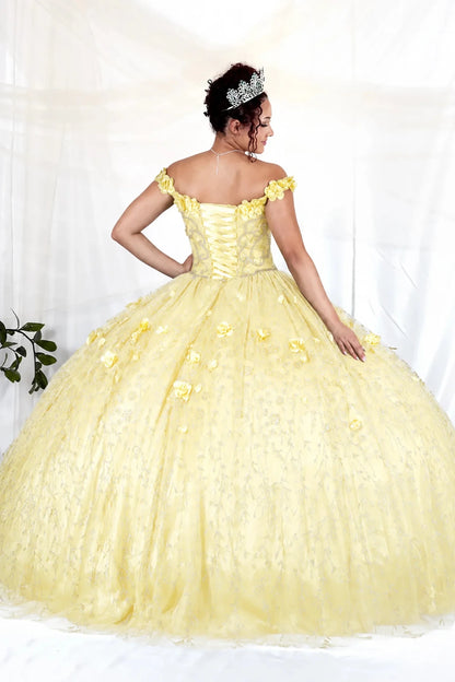 Detailed view highlights yellow quinceañera ball gown with off‑shoulder neckline, floral applique and flowing skirt.