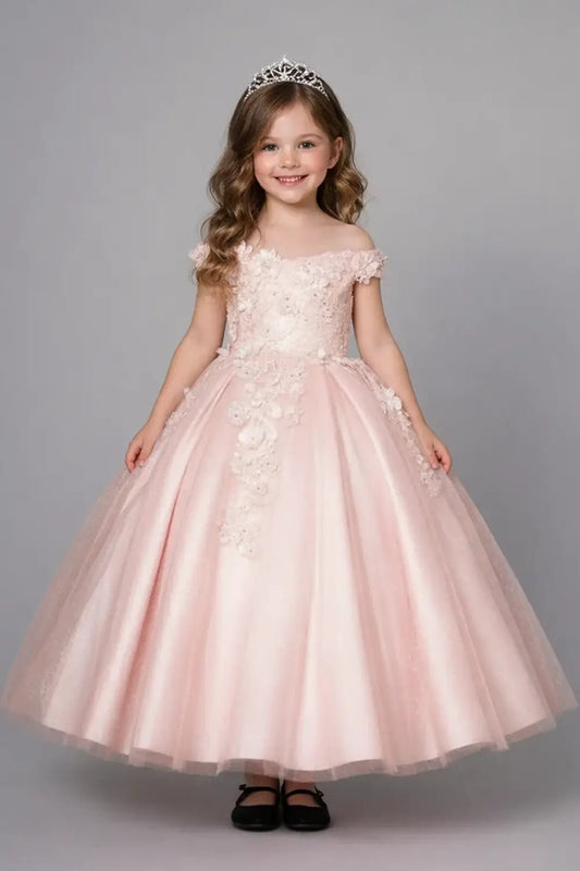 Kid standing front-facing in stunning blush ball gown with 3D floral appliqué bodice, glitter accents, and voluminous full skirt