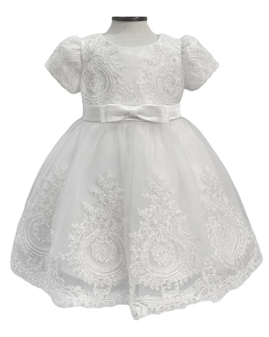 White lace kid dress with a bow on a mannequin against a white background