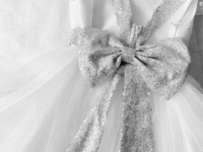 Silver / White USA Made | Sequin V-Back Tulle Flower Girl Dress with detachable Ribbon pin - zoomed in view of silver bow